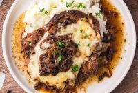 French Onion Pork Chops with Caramelized Onions and Gruyère