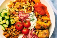 Sheet Pan Greek Veggie Bowls with Feta and Lemon Herb Dressing