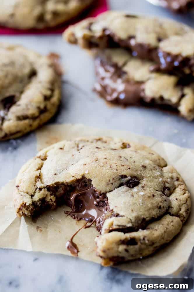 Nutella-Filled Chocolate Chip Cookies 2 Nutella Stuffed Cookies - made with brown butter and sprinkled with sea salt!