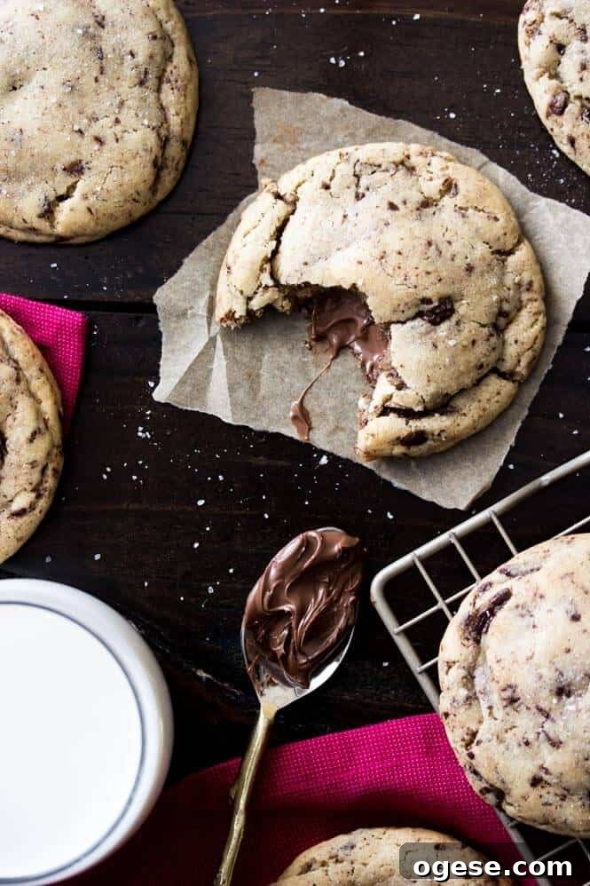 Nutella-Filled Chocolate Chip Cookies 5 Nutella Stuffed Cookies - made with brown butter and sprinkled with sea salt!