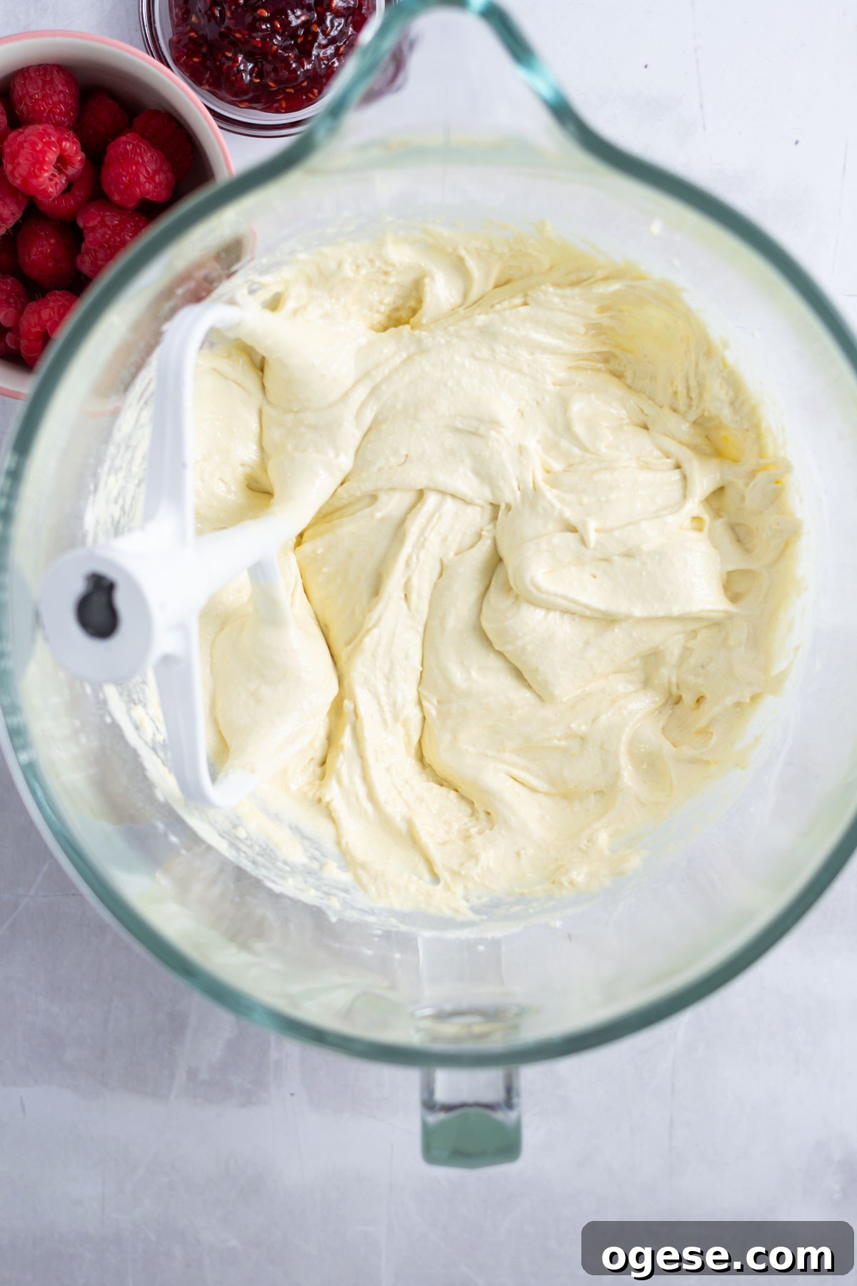 almond flour and flour added to the sugar and eggs in a mixing bowl