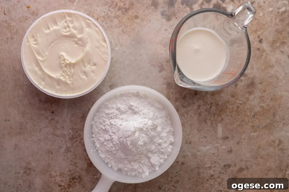 Vanilla mascarpone frosting ingredients for Black Forest cinnamon rolls