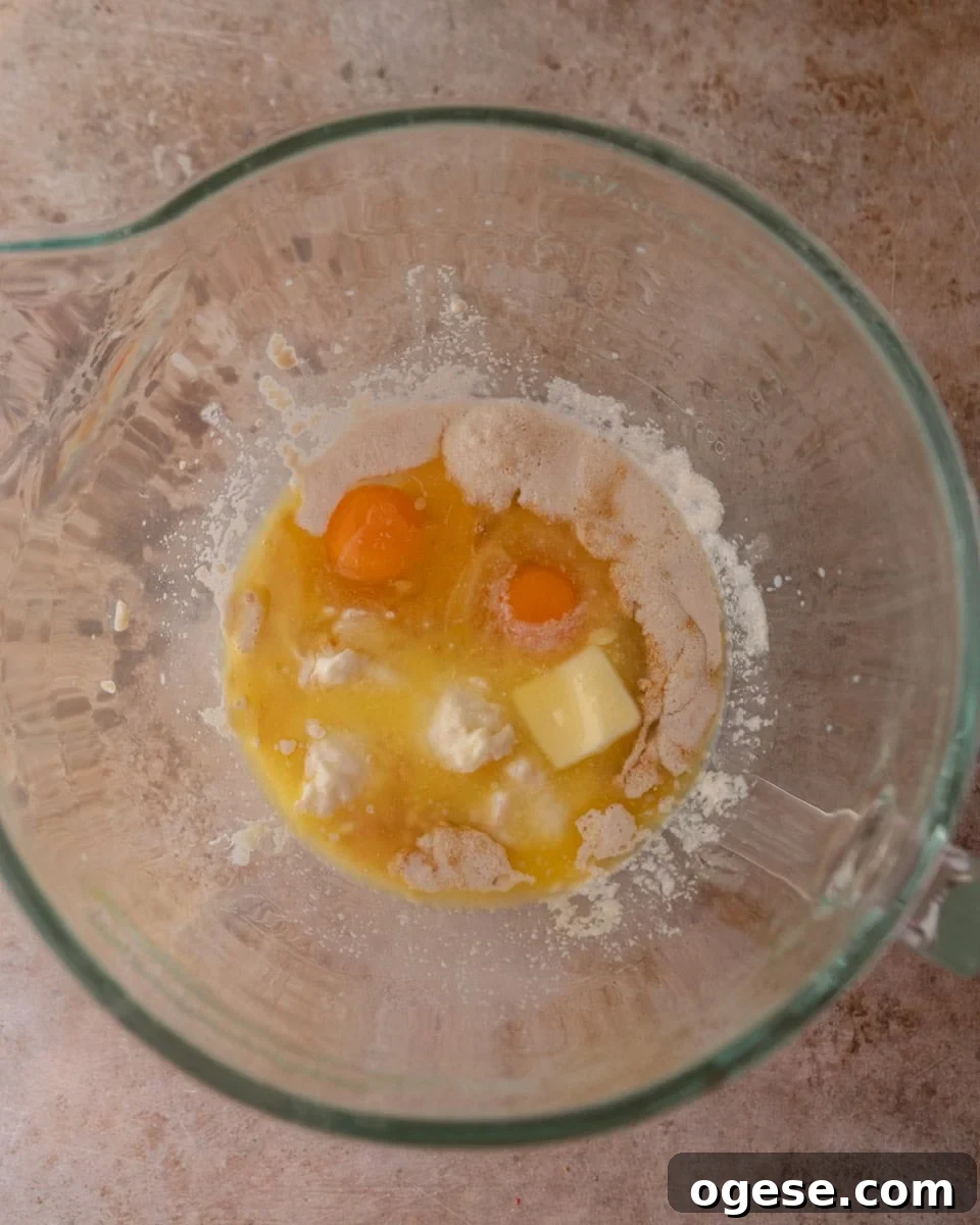 Wet ingredients in a mixing bowl before combining