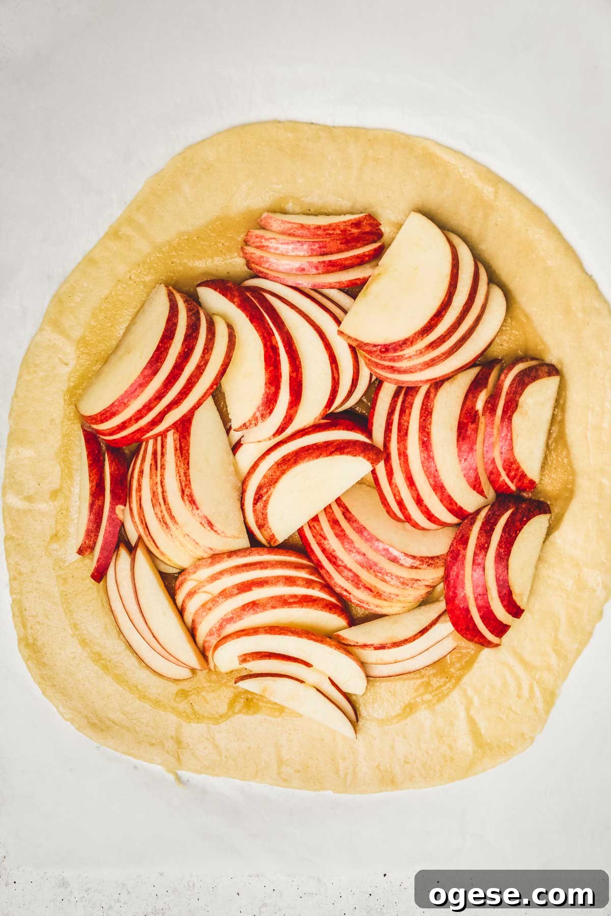 Rustic French Apple Tart Recipe: Classic Free-Form Tarte Tatin Alternative 7 Pastry dough with applesauce and apple slices