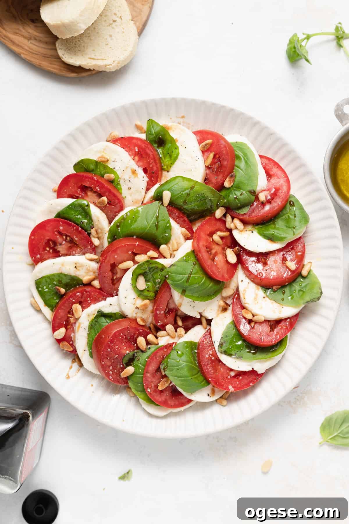 Classic Caprese Salad Recipe: Fresh Mozzarella, Tomatoes & Basil 2 Caprese salad on a plate.