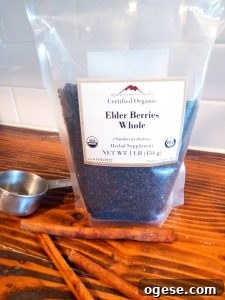 Need to kick a cold or flu fast? Make this easy and delicious Elderberry Syrup at home to cut your sickness time in half! Kid and pregnancy safe!