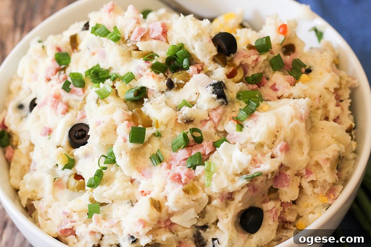 mashed potato salad in a white bowl