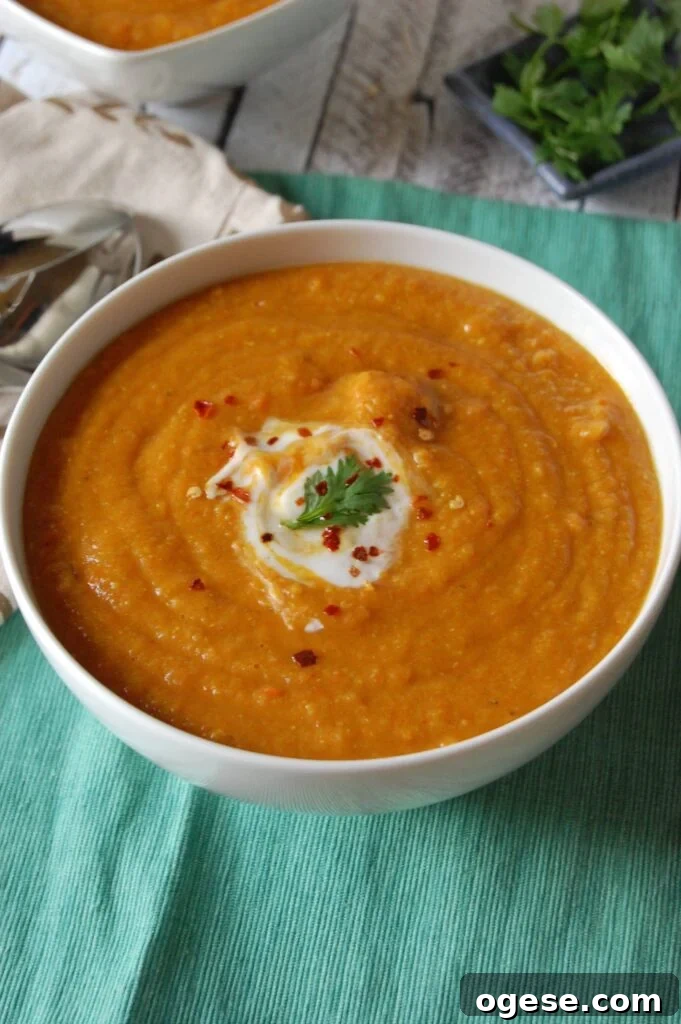 Moroccan Carrot Red Lentil Soup in white bowl 