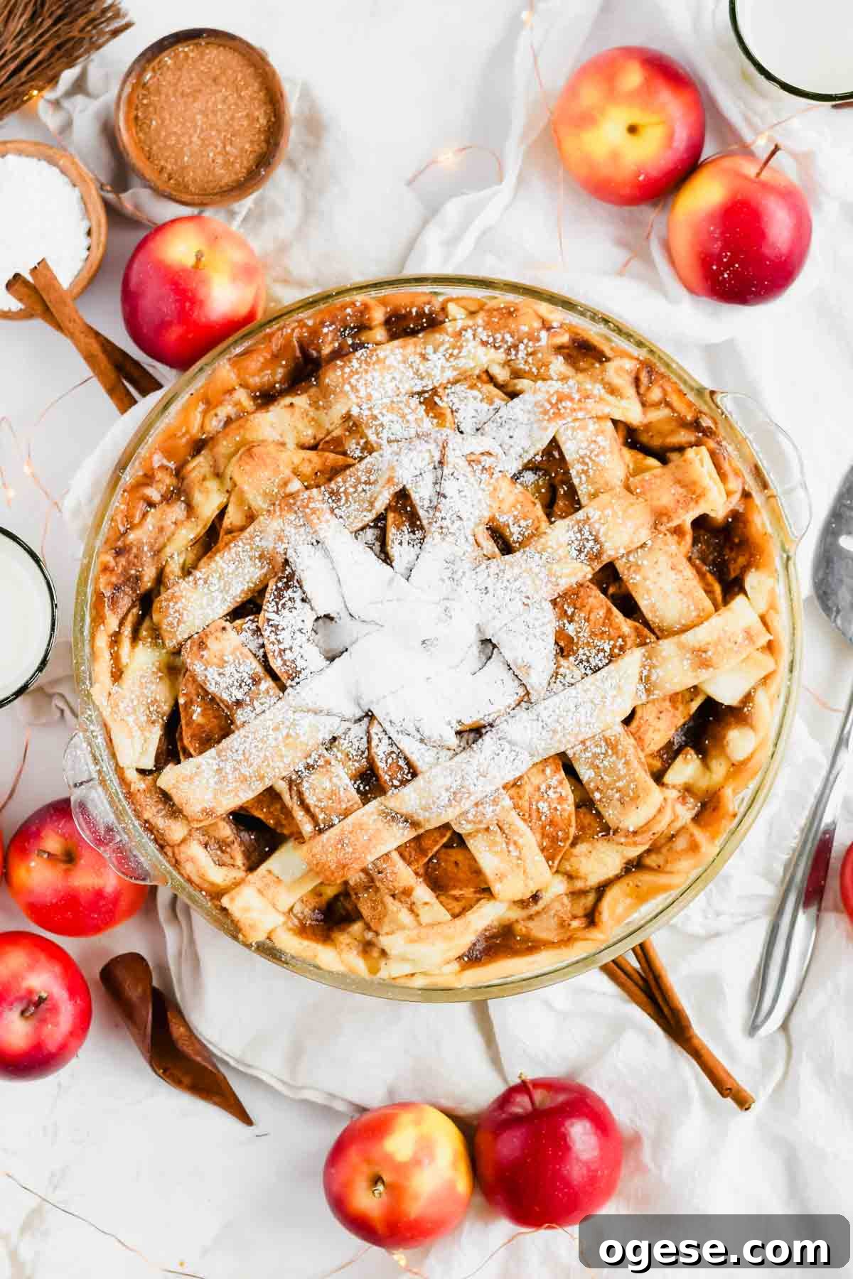 A freshly baked easy apple pie with store bought crust in a glass pie dish.