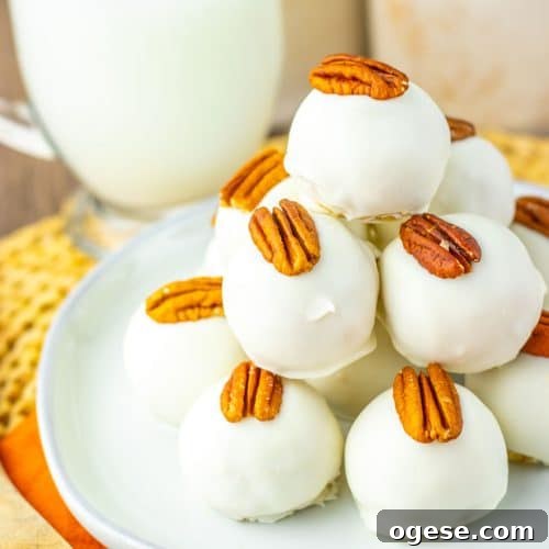 a stack of pecan pie truffles on a white plate