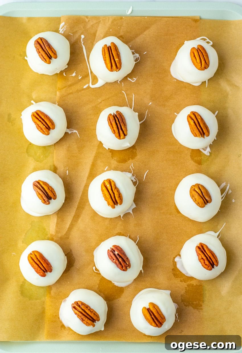 pecan pie truffles arranged in rows on a sheet of brown parchment paper