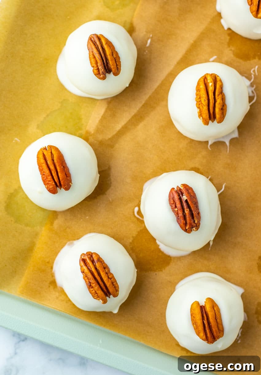 pecan pie truffles arranged in rows on a sheet of brown parchment paper