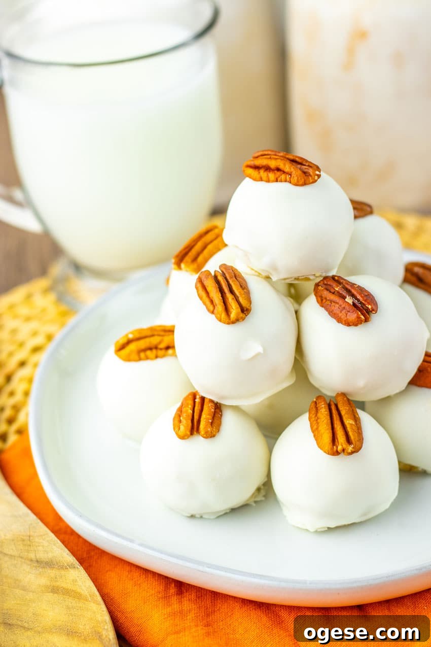 a stack of pecan pie truffles on a white plate