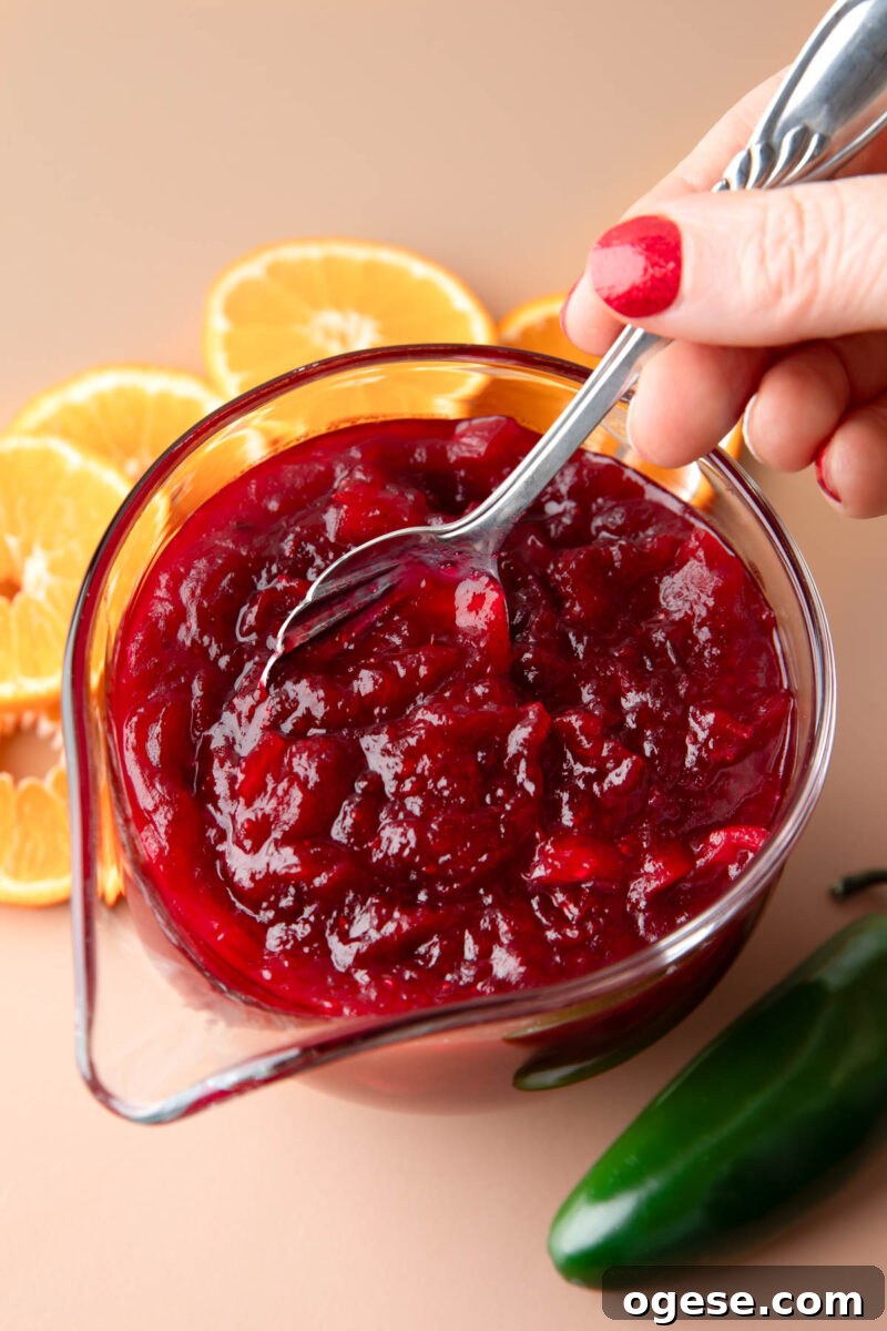Spicy Jalapeño Cranberry Sauce Recipe for Holiday Meals 3 glass serving bowl with Jalapeno Cranberry Sauce