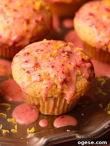 Strawberry lemonade, muffins on a silver platter.