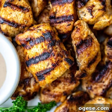 Chicken nuggets with grill marks.