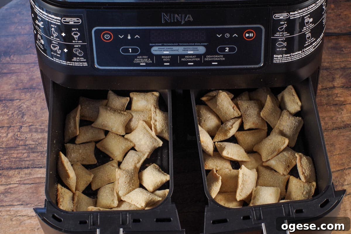 frozen pizza bites in drawer of air fryer