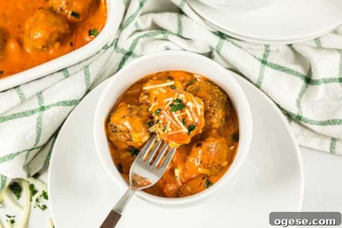 Low-Carb Taco Casserole with Cheesy Cauliflower Crust 15 overhead view of keto italian meatball casserole in a small serving bowl