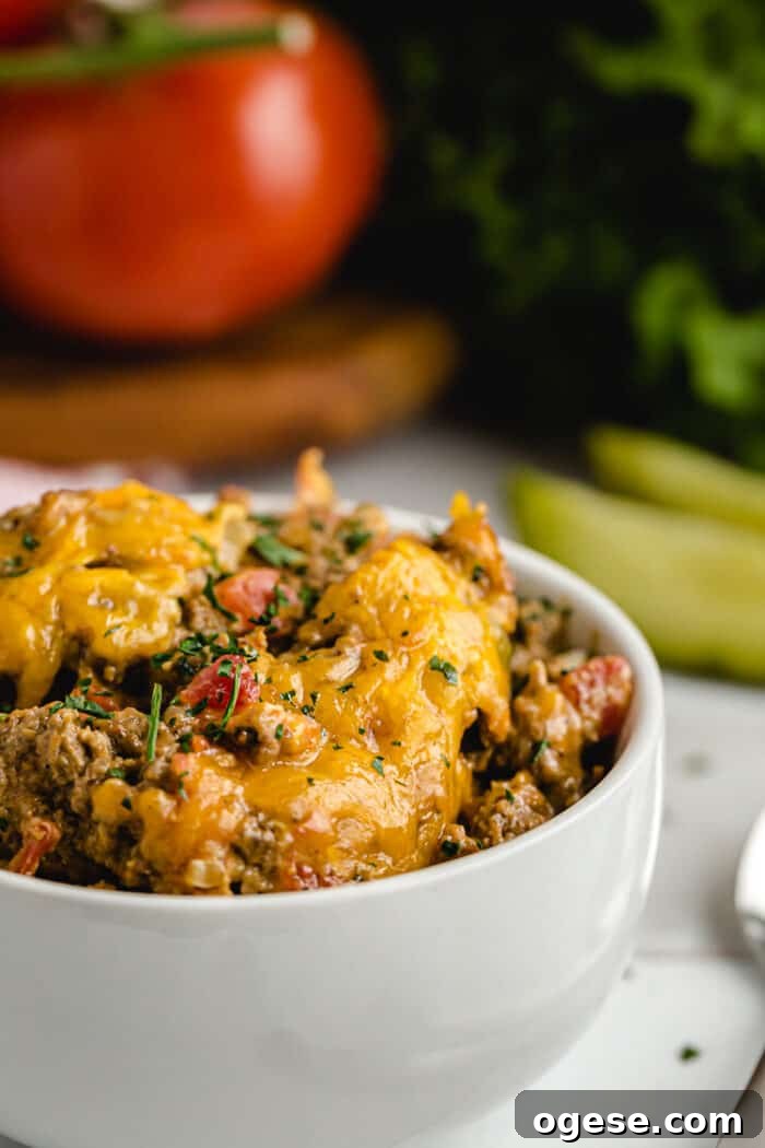 Low-Carb Taco Casserole with Cheesy Cauliflower Crust 18 keto cheeseburger casserole in serving bowl