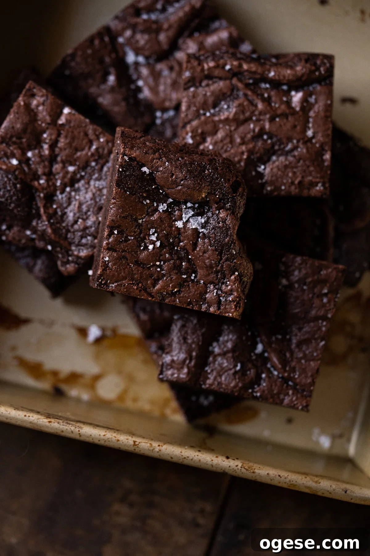 Almond Flour Brownies with Crackly Top — Fudgy Gluten-Free Treat 5 Closeup freshly cut almond flour brownie stack showing their shiny tops