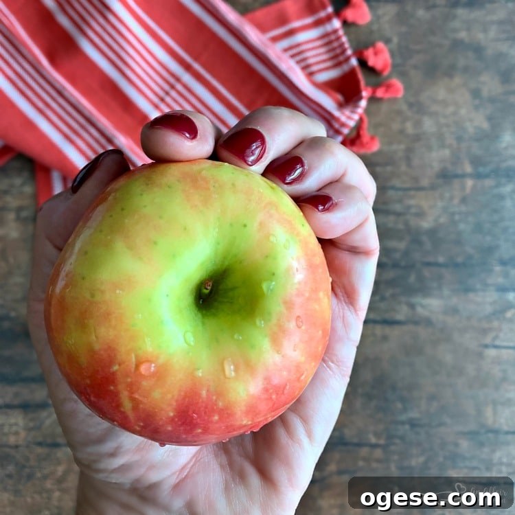 Medium apple in hand