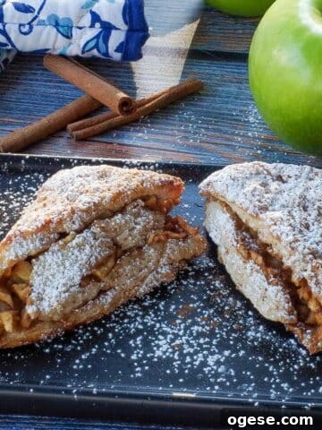 apple cinnamon scones on a black serving platter