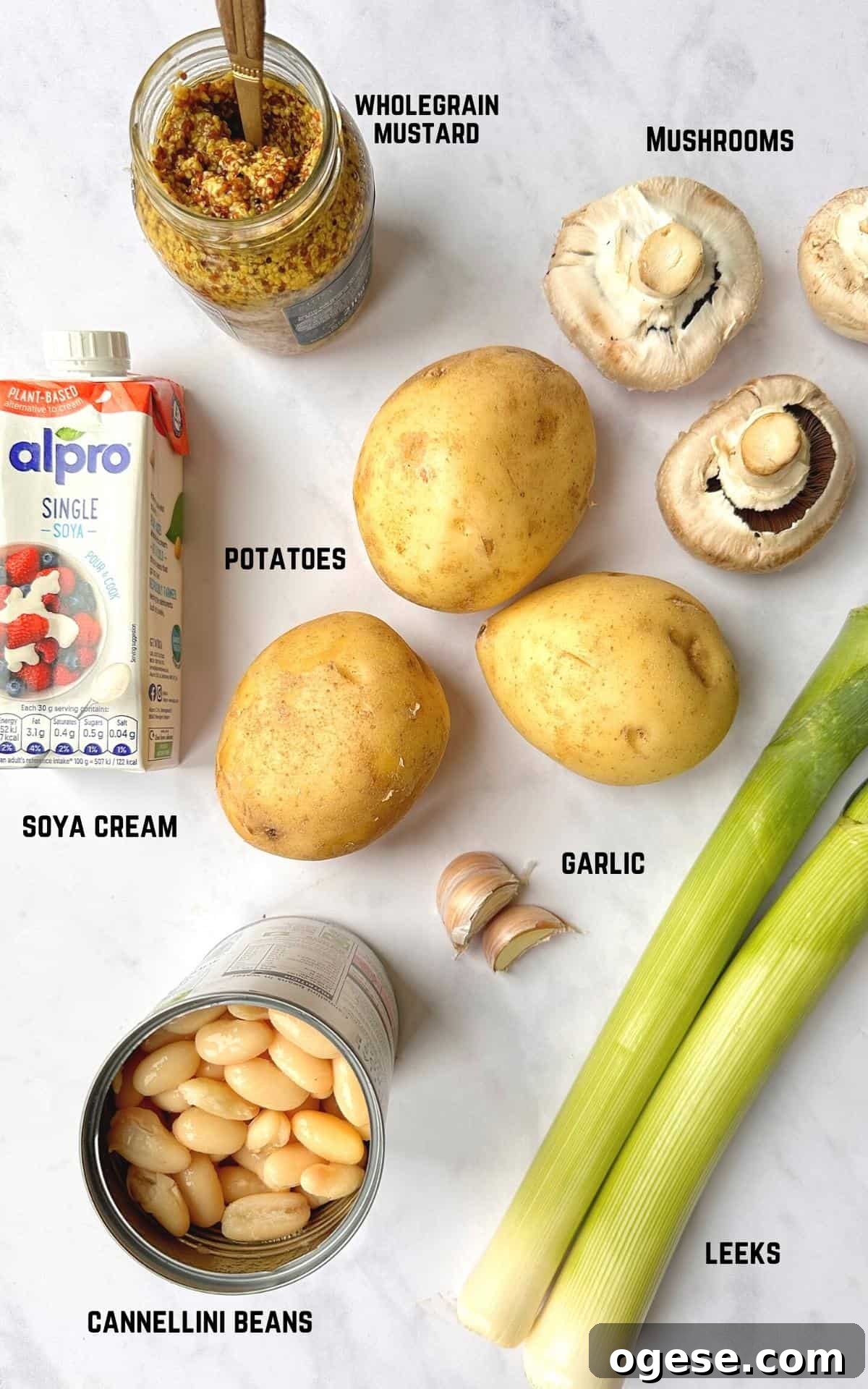 Vegan Mushroom Pie ingredients on a marble background.