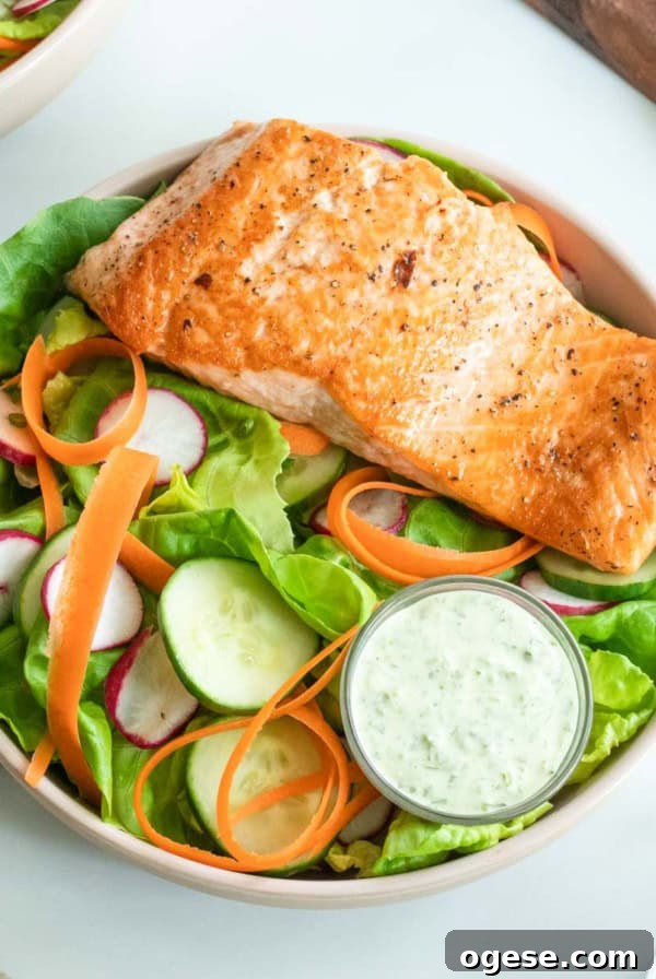 Crisp Bibb Lettuce Salad with Lemon Vinaigrette 12 Seared salmon salad on a marble table.