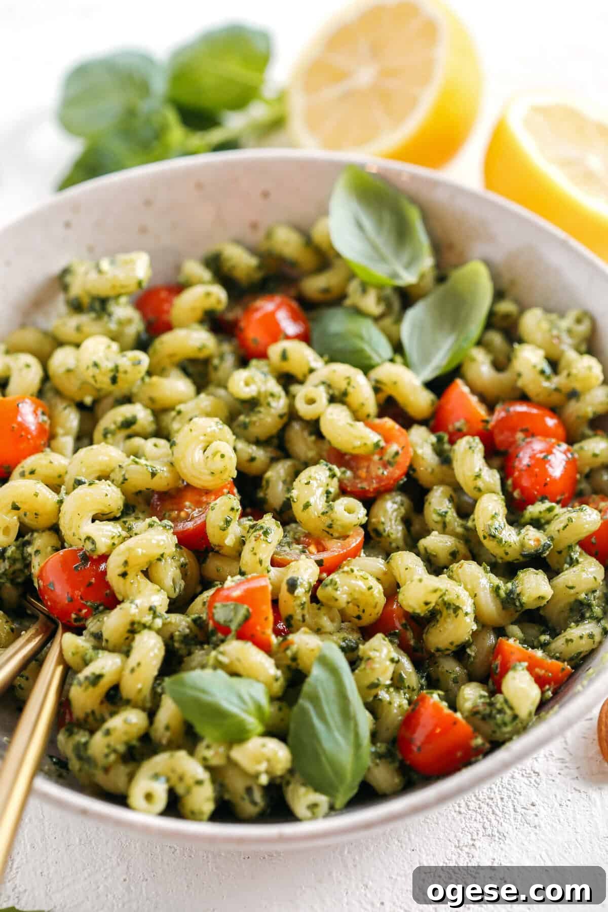 This Simple Basil Almond Pesto recipe combines fresh, delicious ingredients that is easily made in just 10 minutes! So versatile and perfect with pizza, pasta, chicken, shrimp or veggies!