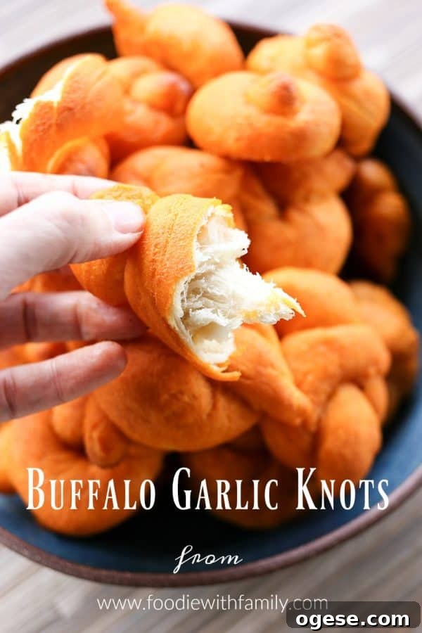 Buffalo Garlic Knots: tender, three bite sized spicy Buffalo Garlic Knots from foodiewithfamily.com
