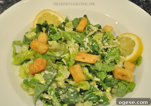 Easy Chicken Caesar Salad - The Grateful Girl Cooks! Croutons and lemon slices are added to caesar salad.
