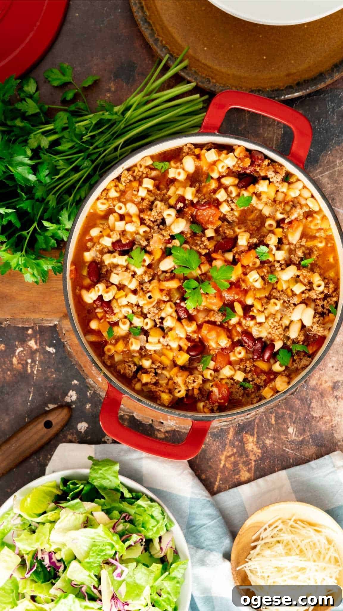 Instant Pot Pasta e Fagioli Soup: Quick Italian Comfort Meal 2 Instant Pot Pasta e Fagioli in a red pot garnished with fresh parsley.