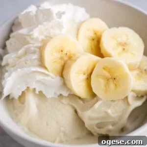 Make Banana Cream Pie Ice Cream in Your Ninja Creami 10 Ninja Creami banana cream pie ice cream topped with sliced bananas and whipped cream