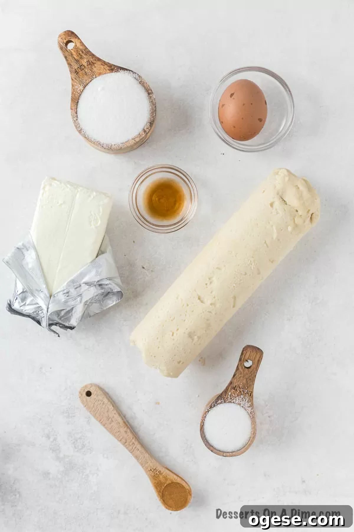 Ingredients for Snickerdoodle cheesecake bars - sugar cookie dough, sugar, cinnamon, cream cheese, eggs, vanilla. 