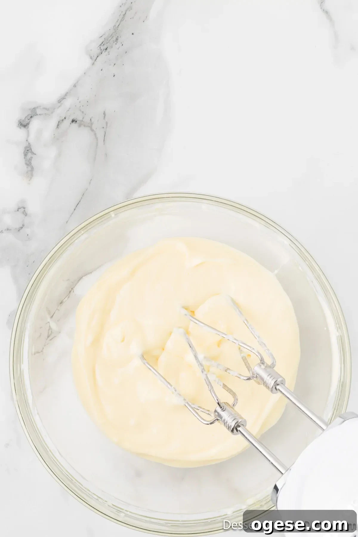 Cheesecake mixture combined in a bowl. 