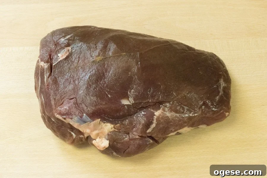 Elk Roast for making jerky on cutting board