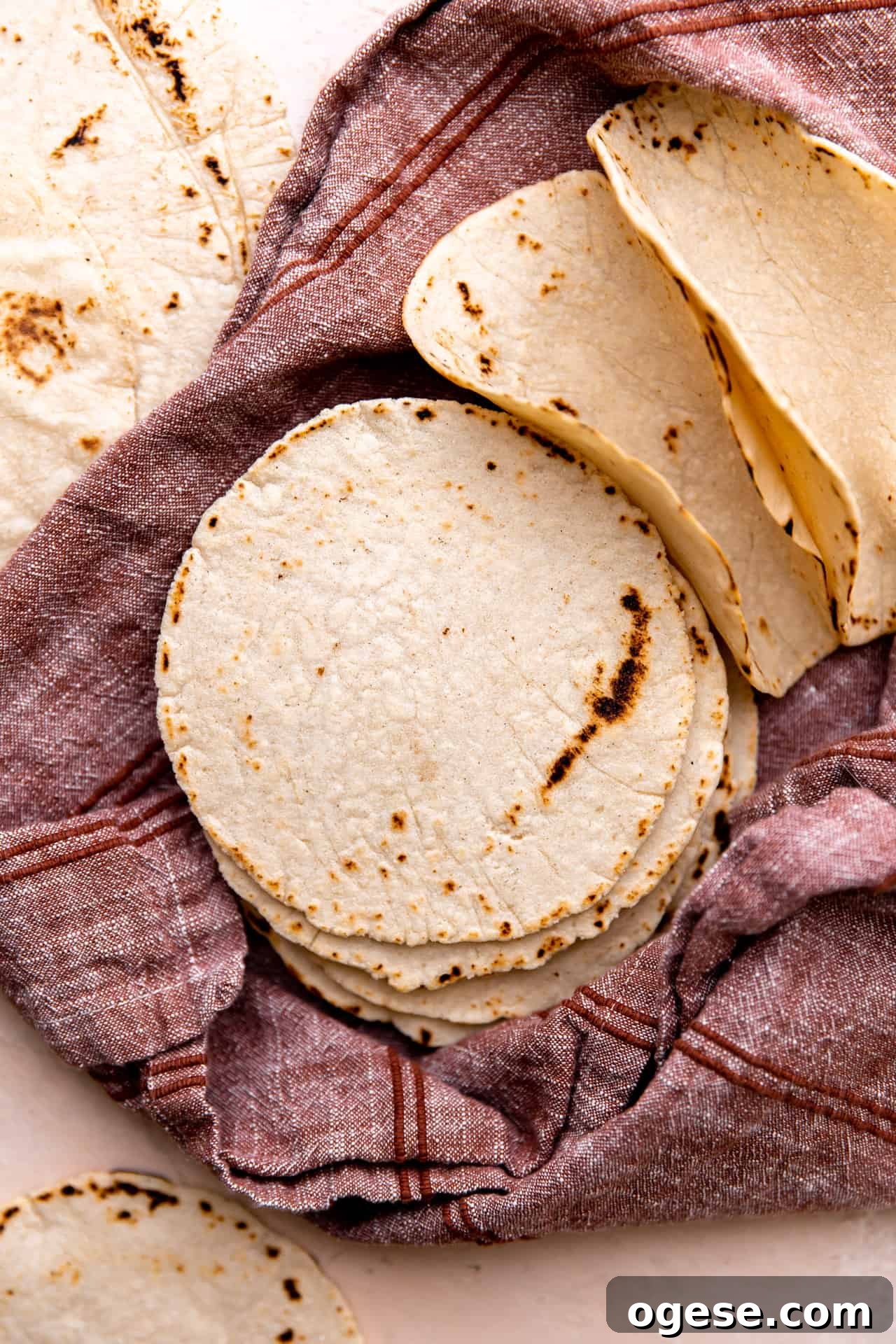 How to Make Authentic Homemade Corn Tortillas at Home 8 Stack of fresh homemade corn tortillas.