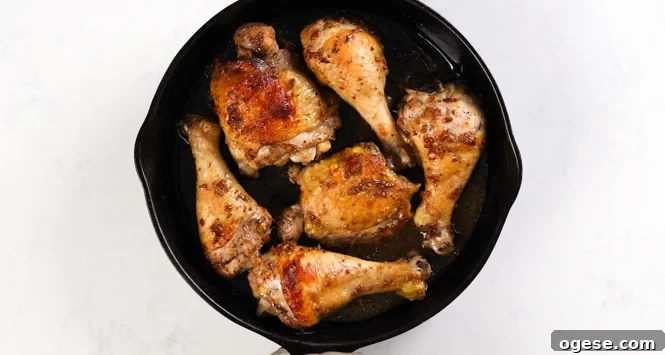 Oven-Baked Jamaican Jerk Chicken Recipe 6 Oven baked jerk chicken in a skillet.