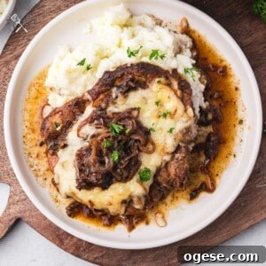 French Onion Pork Chops with Caramelized Onions and Gruyère 7 French Onion Pork Chops Featured Image