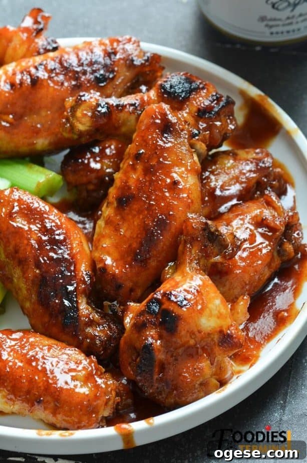 Juicy BBQ Chicken Wings Made Fast in the Instant Pot 8 instant pot honey bbq chicken wings in a white plate