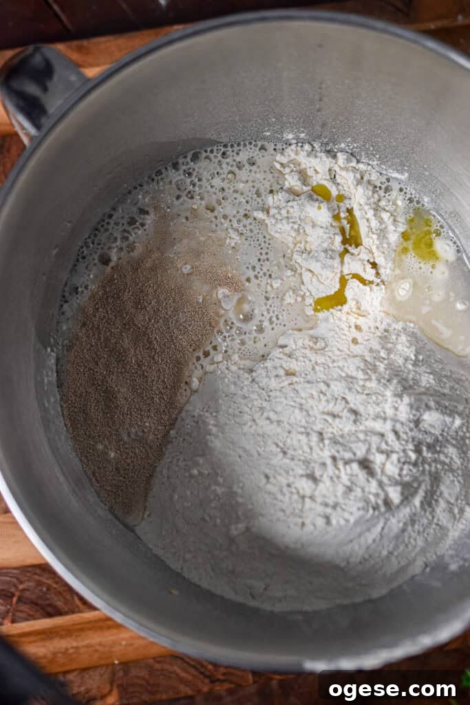 How to Make Crispy-Outside, Airy Ciabatta at Home 4 All the ingredients are in the bowl of stand mixer.