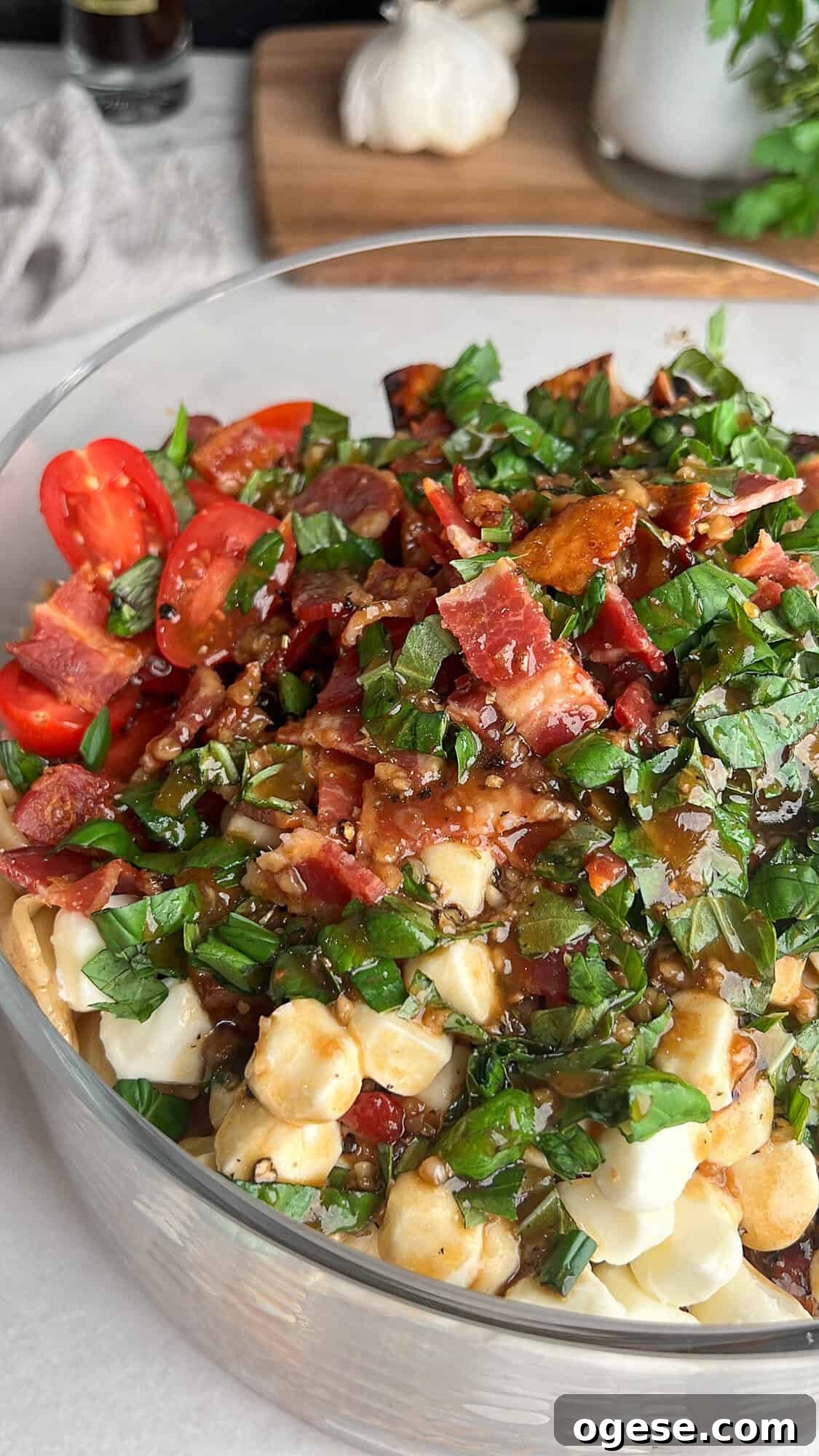 Finished caprese pasta salad Caprese pasta salad in a bowl