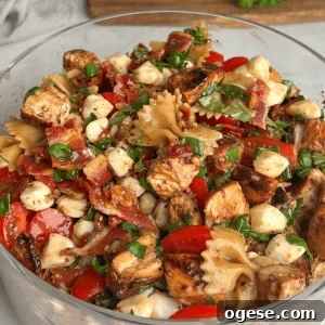 Caprese Pasta Salad Recipe with Tomato, Basil & Mozzarella 2 A bowl of caprese pasta salad