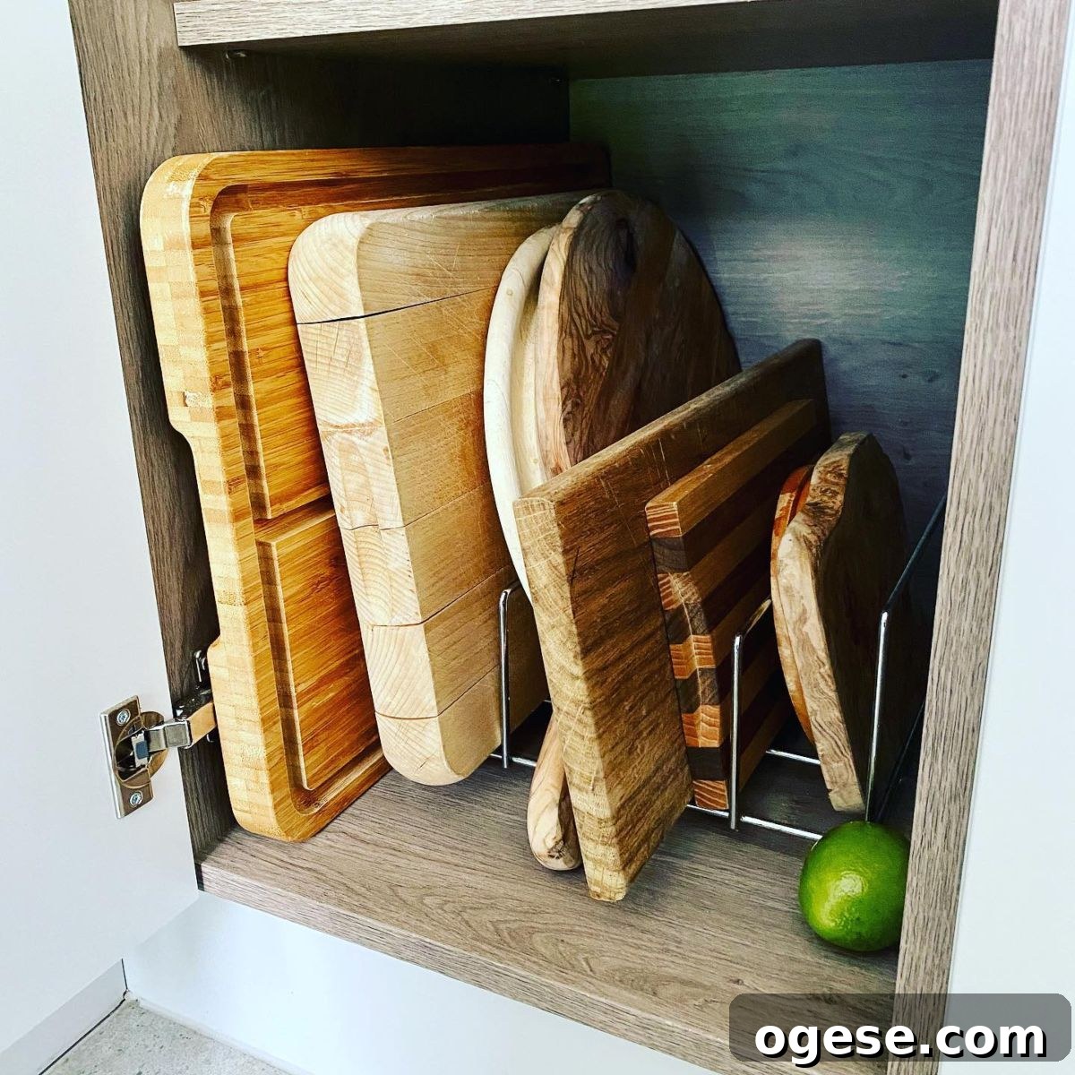 Chopping boards stored vertically on a metal stand