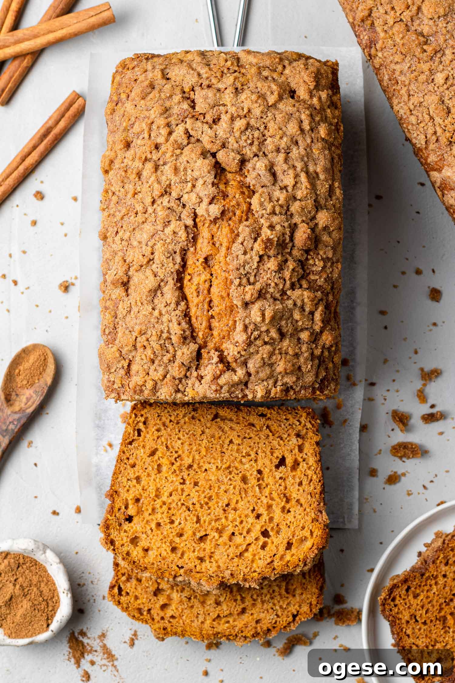 Pumpkin streusel bread Overhead view of a loaf of pumpkin streusel bread, partially sliced.