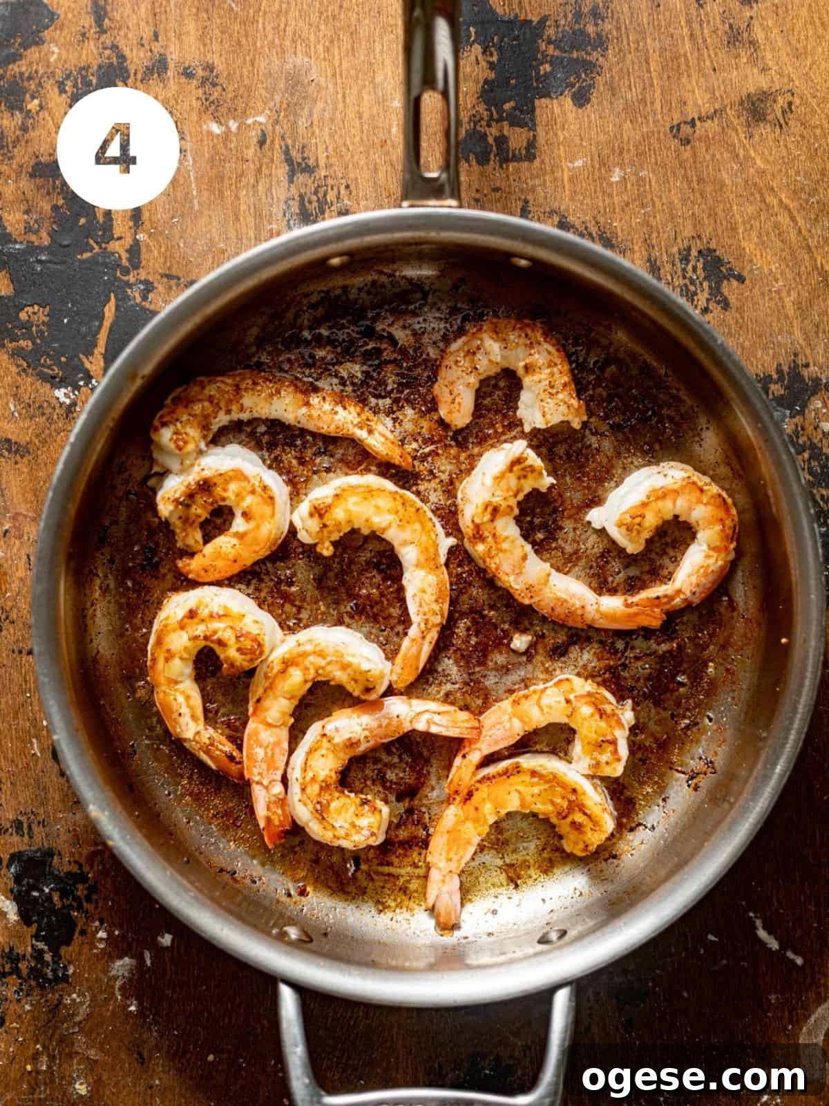 shrimp cooked in a skillet.