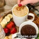 Melting Pot Cheese Fondue (Copycat) recipe in a white mug