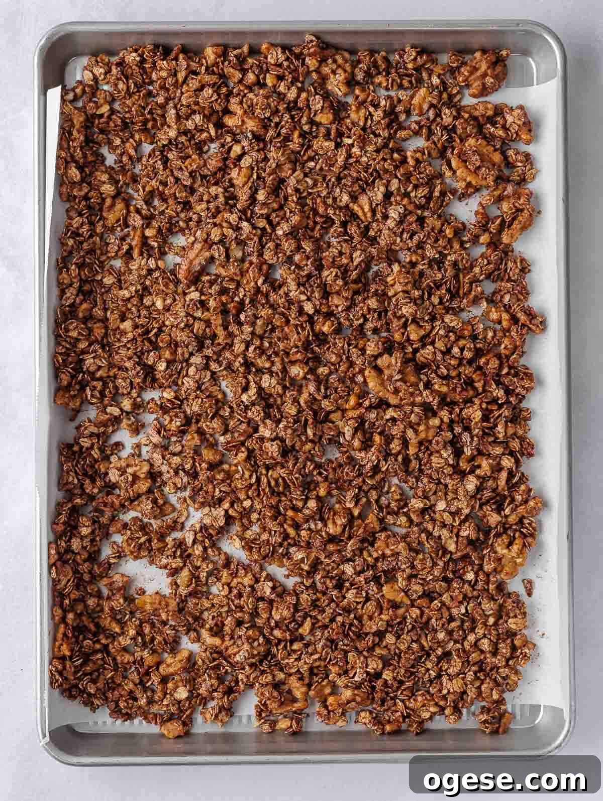 Oat and Walnut granola on a tray.