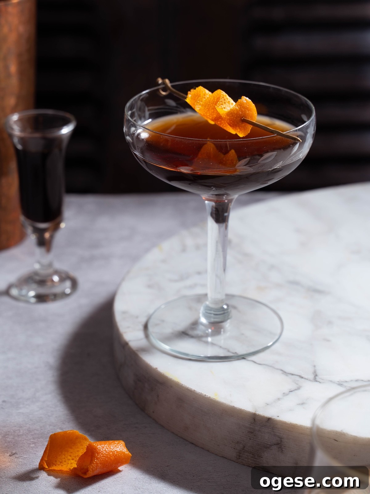Nocino Cocktail: Crafting a Black Manhattan with Walnut Liqueur 6 A nocino cocktail served up in a coupe glass