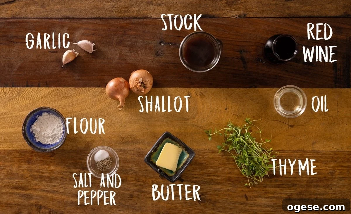 Rich Red Wine Jus Recipe for Steak and Roast 3 A wooden table with ingredients laid out